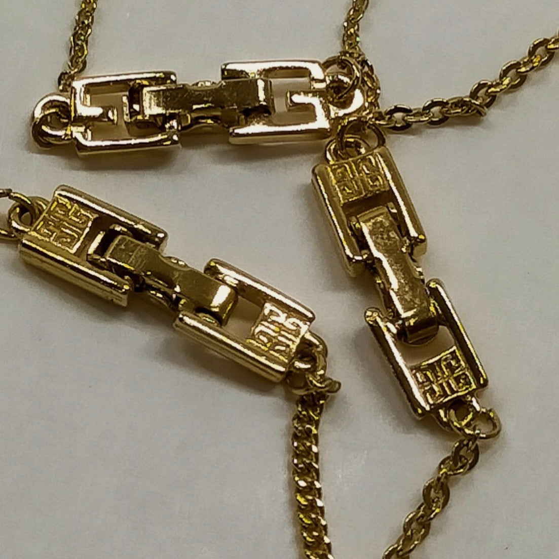 Givenchy Gold Tone Flower Pendant Necklace