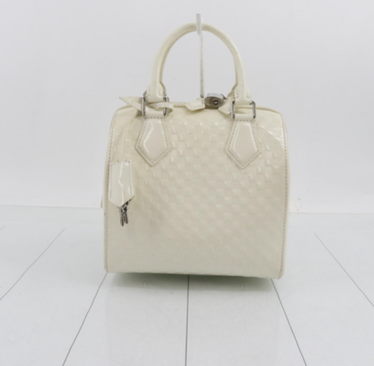 The Cube — Damier Facette Speedy PM