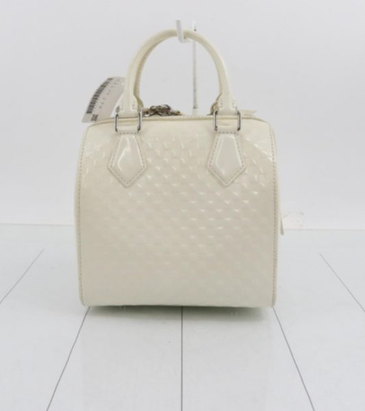 The Cube — Damier Facette Speedy PM